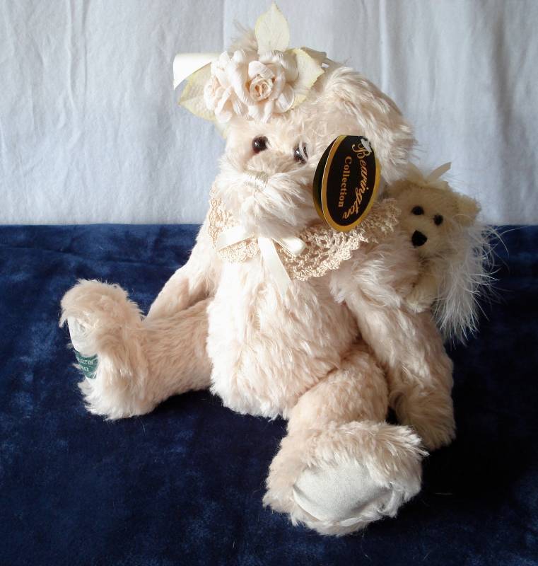 lot 12 image: (set of 2) Collectable Teddy Bears in a Stair Basket