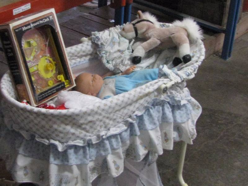 lot 61 image: Basinette & Dolls