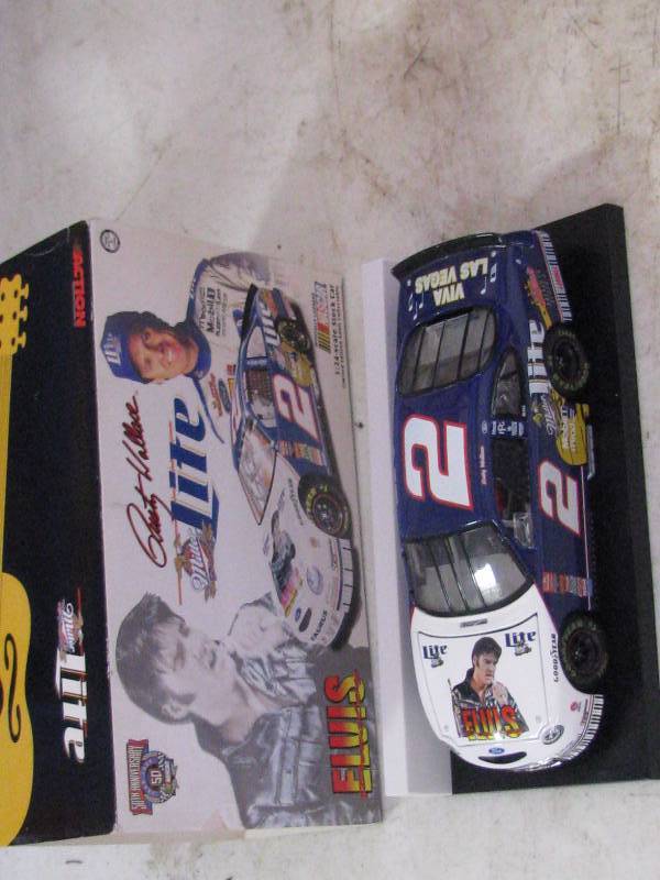 lot 74 image: Die Cast Elvis Race Car Bank