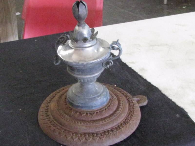 lot 84 image: Antique Wood Stove Topper