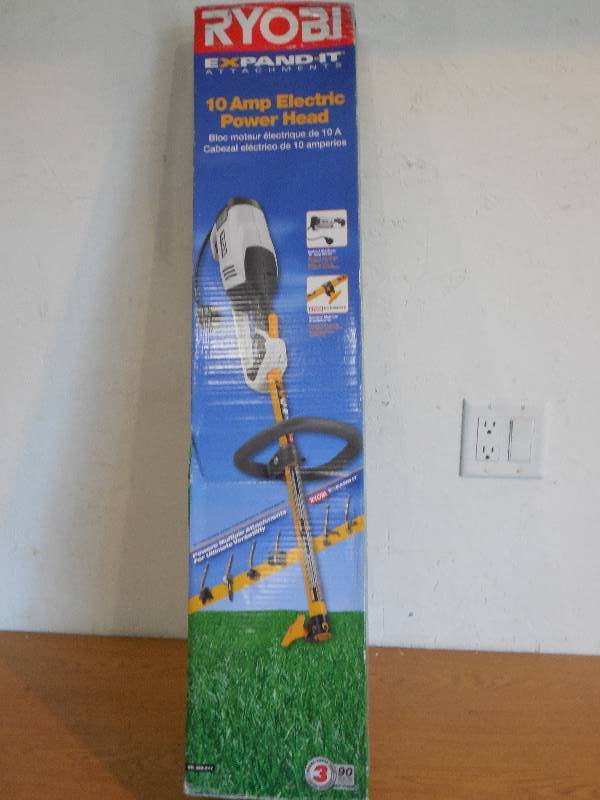 lot 34 image: Ryobi 10-Amp Electric Power Head