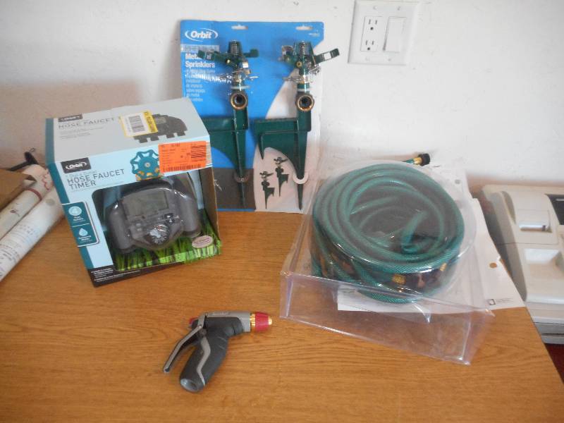 lot 43 image: Garden Hose  Sprinklers  Timer Lot
