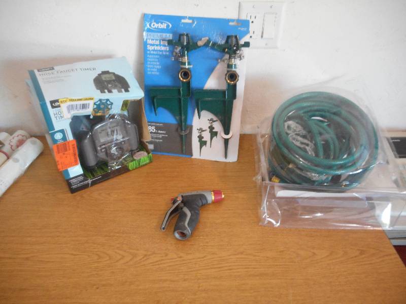 lot 44 image: Garden Hose  Sprinklers  Timer Lot