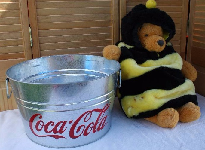 lot 136 image: Coca-Cola Bucket & Plush Pooh Bear