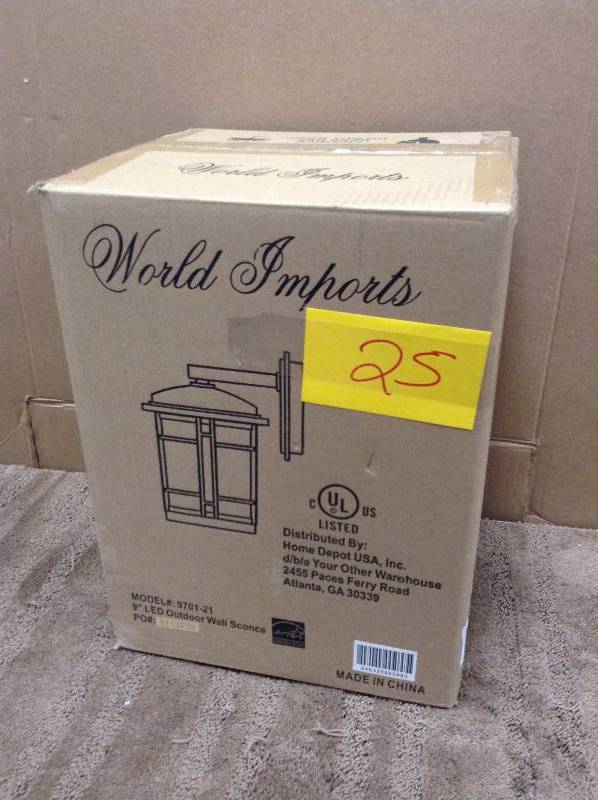 lot 25 image: World Imports Model 9701-21 9 in LED Outdoor Wall Sconce
