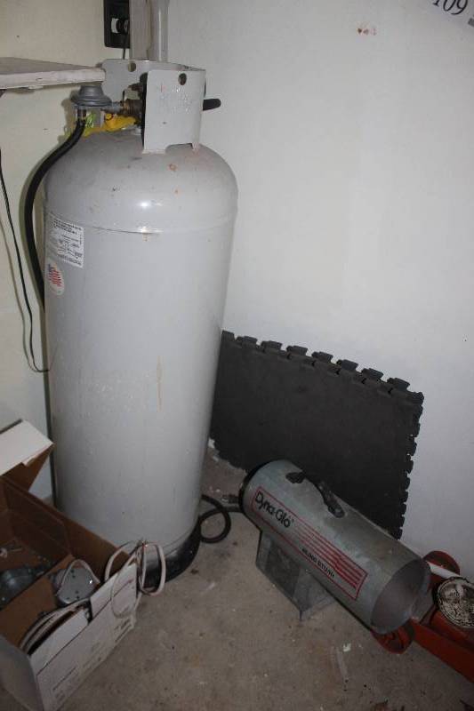 lot 109 image: Dyna-glo 40K BTU Floor Torpedo Heater w Large Propane Tank