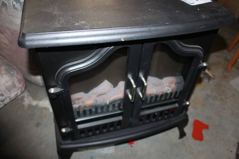 lot 106 image: Electric Iron Stove Style Fireplace