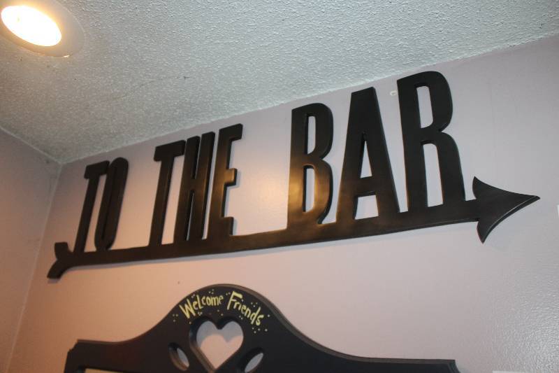 lot 52 image: Metal To The Bar Wall Art