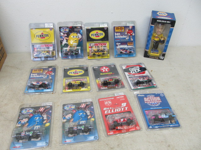 lot 20 image: NIB Diecast Race Cars & Bobblehead 