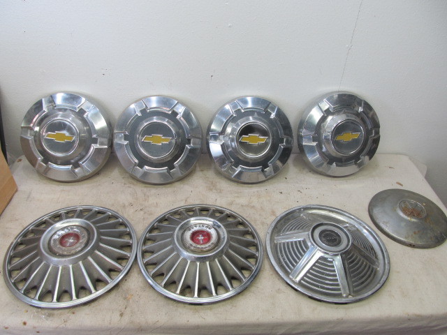 lot 31 image: Lot of Vintage Hubcaps