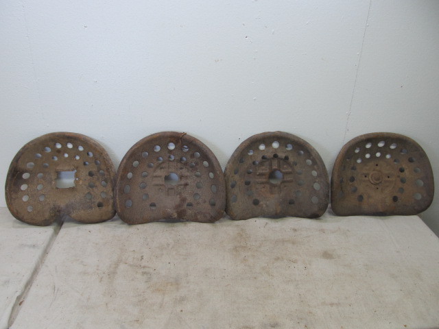 lot 133 image: 4 Antique Steel Tractor Seats