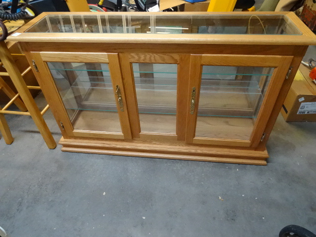 Wood display case. 2 doors. Glass s...