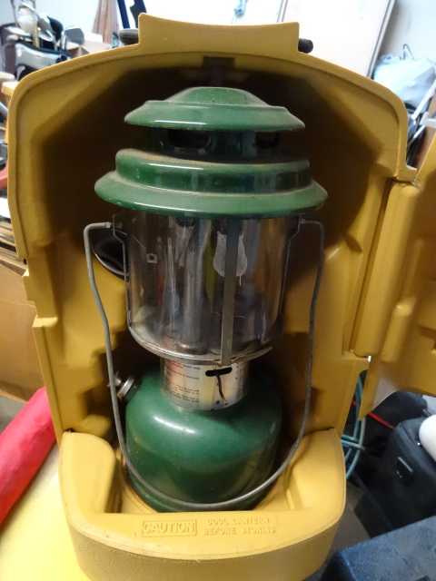 Coleman white gas lantern with carr...