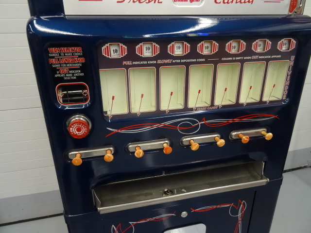 Stoner Theater candy machine. Holds 160 bars. 68 x 30 x 14. 240 lbs. Fully restored and functional.