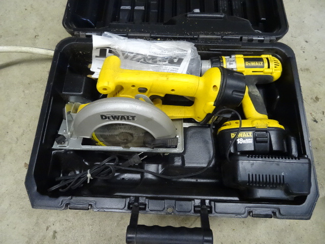 lot 91 image: Dewalt 18 Volt Saw and Drill Kit. Comes with 2 Batteries and 1 Charger