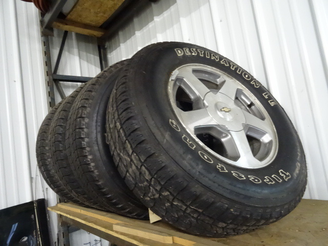 lot 205 image: Set of 4 Firestone Tires on Chevy Rims