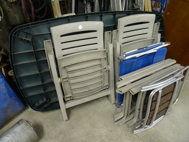 lot 211 image: Poly patio table with misc patio chairs