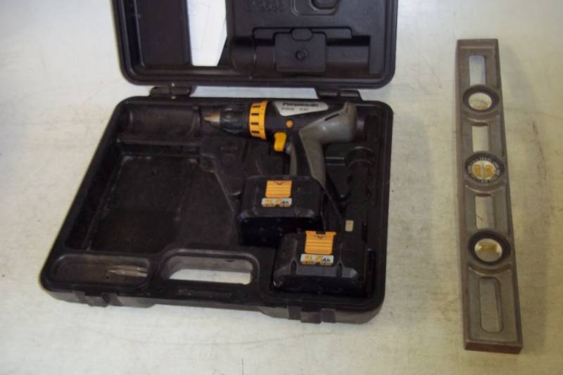 lot 81 image: Sands Level and Panasonic Drill with 2 Batteries and Case