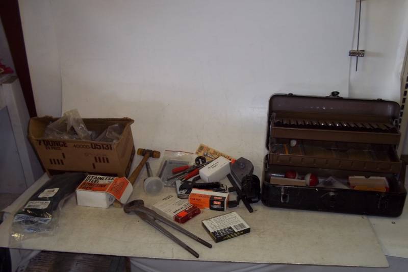 lot 84 image: Lot containing stapler with staples, fishing tackle box, box of door hinges, etc
