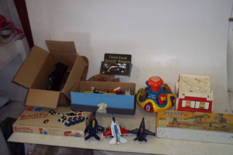 lot 87 image: Lot of vintage toys including cars, planes, etc
