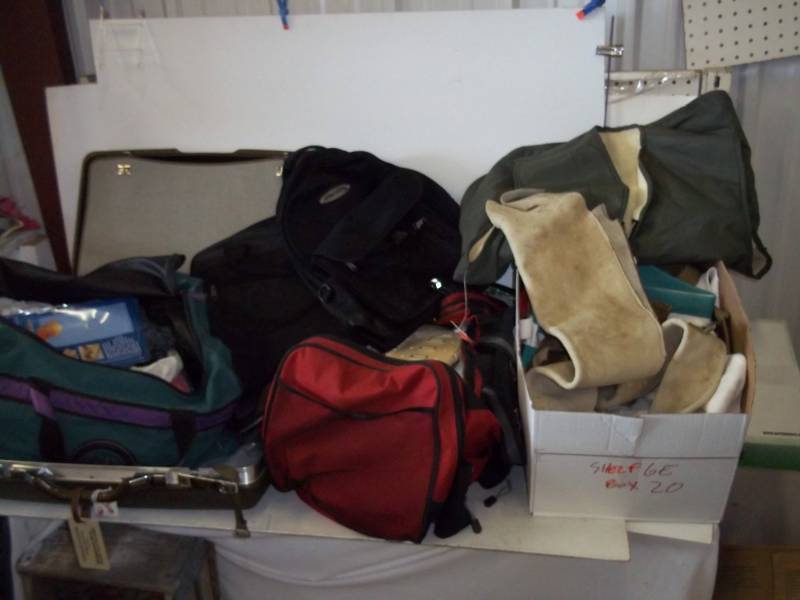 lot 91 image: Leather Gun Case. Fiber cleaning rags, backpacks, suitcase, etc