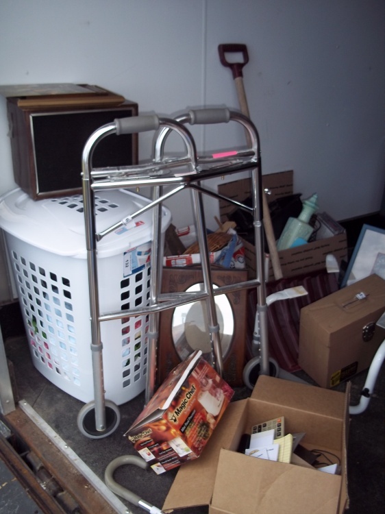 lot 101 image: Bathroom Helper-Up, Walker, Cane, Picture Frames, Magic Chef Food Processor, Box of CDs, Notepads