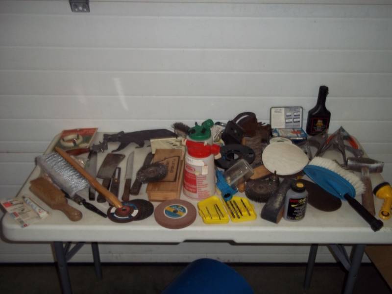 lot 105 image: Assorted Brushes, Spring Clamps, C-Clamp, Power Steering Fluid, Assorted Knives, Meat Cleaver, Grinding Wheels, Nozzle, Air Nozzle, Sprayer Nozzles