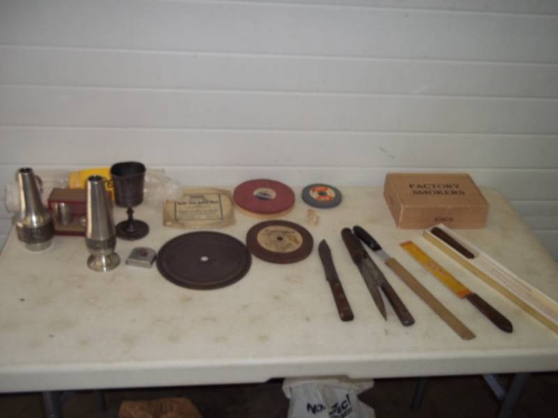 lot 130 image: Assorted Kitchen Knives, Grinding Wheels, Buffing Wheel, Assortment of Goblets, Vintage Cigar Box