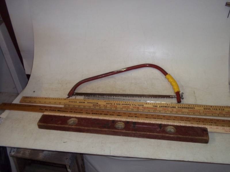 lot 131 image: Assorted Rulers, Saw, Vintage Level