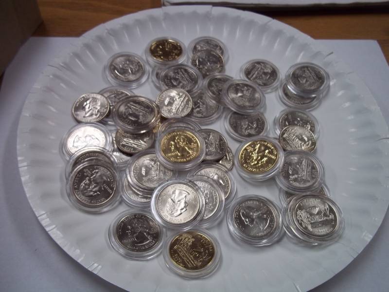 lot 45 image: Large Assortment of Arkansas State Quarters in Cases
