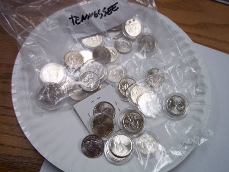 lot 49 image: Large Assortment of Wyoming and Tennessee State Quarters in Cases