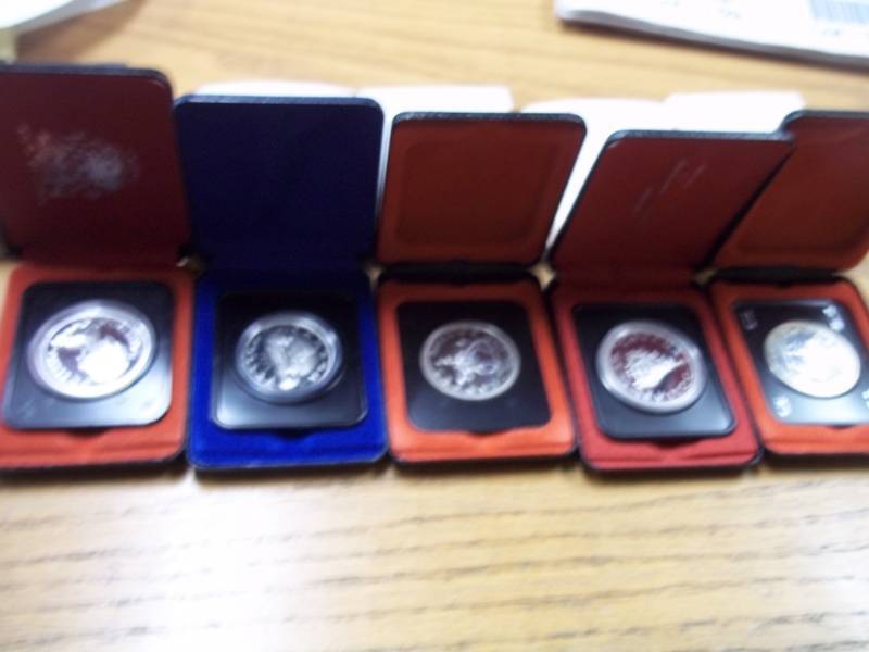 lot 155 image: 5 Canadian Dollars in Cases
