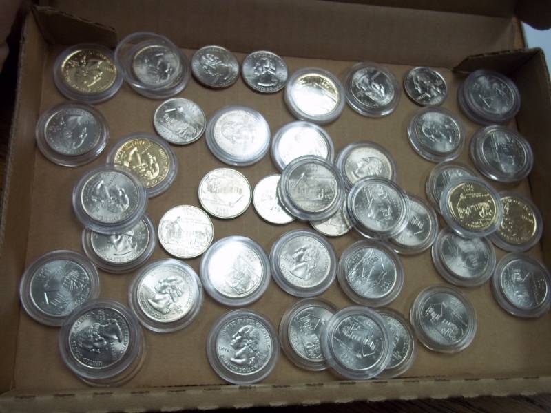 lot 203 image: Iowa State Quarters in Cases
