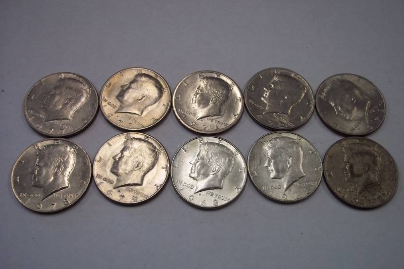 lot 215 image: 10 Half Dollars