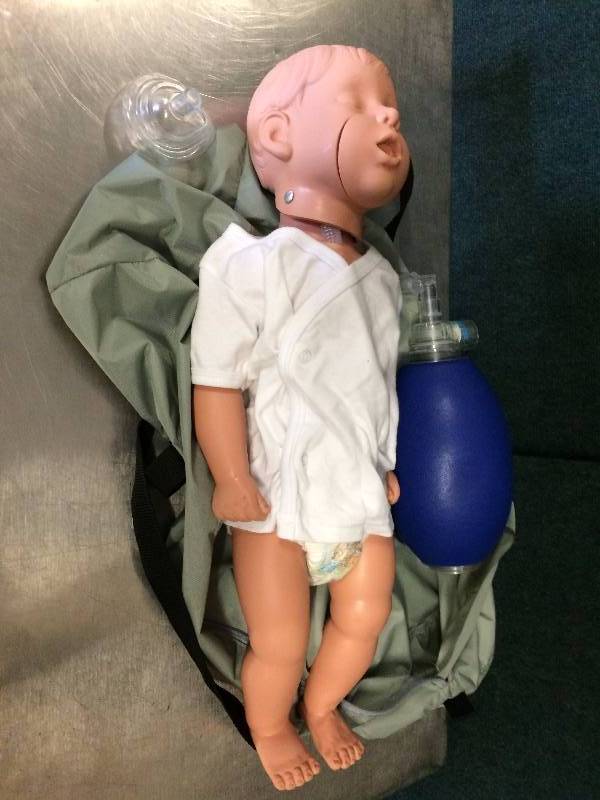 lot 21 image: Retails New $500 6-9 Month Infant CPR Manikin Practice Baby Resuscitation Life Saving Teaching Tool with Carry Bag - Excellent Condition