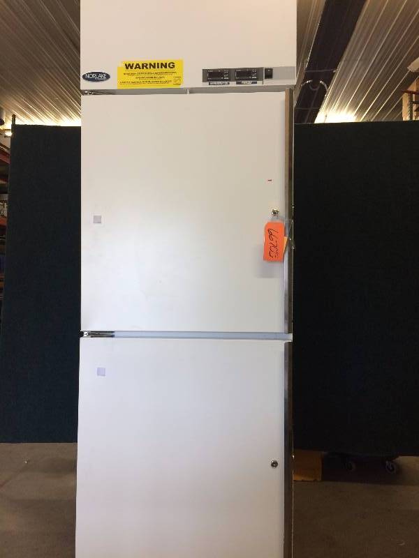 lot 87 image: WOW Retails New $11,000 Norlake Premier Restaurant Laboratory Pharmacy 2 Door Reachin Combination Cooler Locking Refrigerator and Freezer NSRF202WWW0 Excellent Condition See Brochure