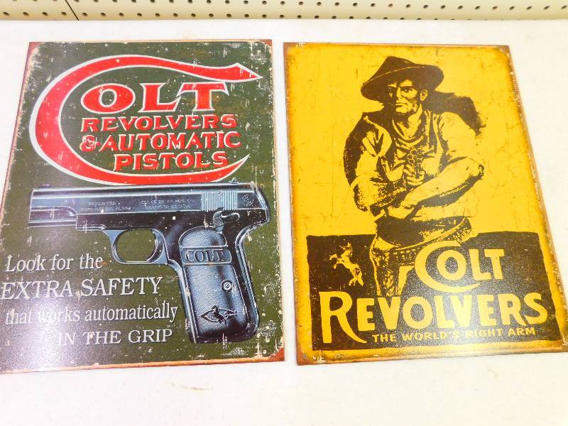 TWO METAL SIGNS