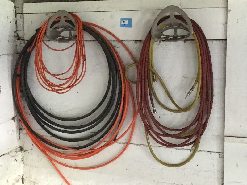 lot 39 image: Hose Hangers With Hoses