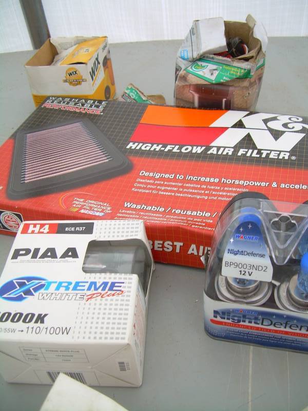 lot 25 image: 24949 AIR FILTER, REPLACEMENT MOTION SENSER, AIR FILTER, H4 NIGHT BULBS, 3 WIRE POWER CORD