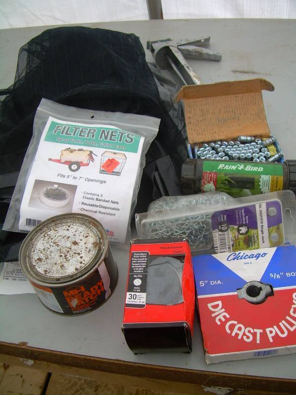 lot 38 image: 3 PC WINDOW KIT , 30 FOOT LIGHT GALVANIZED CHAIN , STEEL DROPINS, SPRAYER FILTERS, DRYER OUTLET,PULLYS
