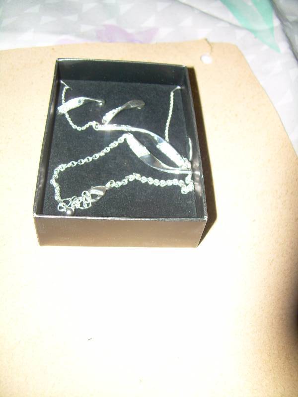lot 63 image: SILVER NECKLACE , BRACELETT AND EARINGS