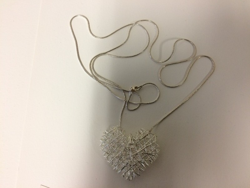 lot 12 image: Sterling Silver Heart Necklace on 35 Chain