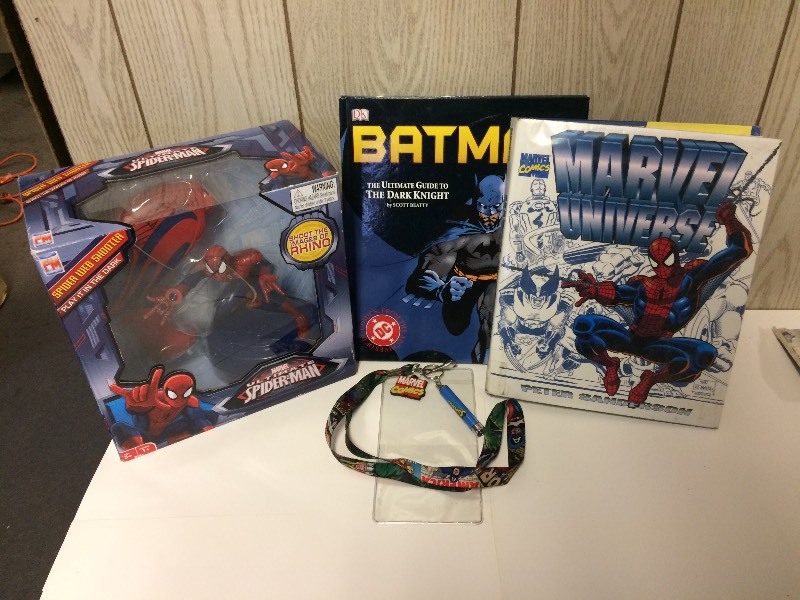 lot 58 image: New Spider Man Shooter Plus Books Batman & Marvel Univers