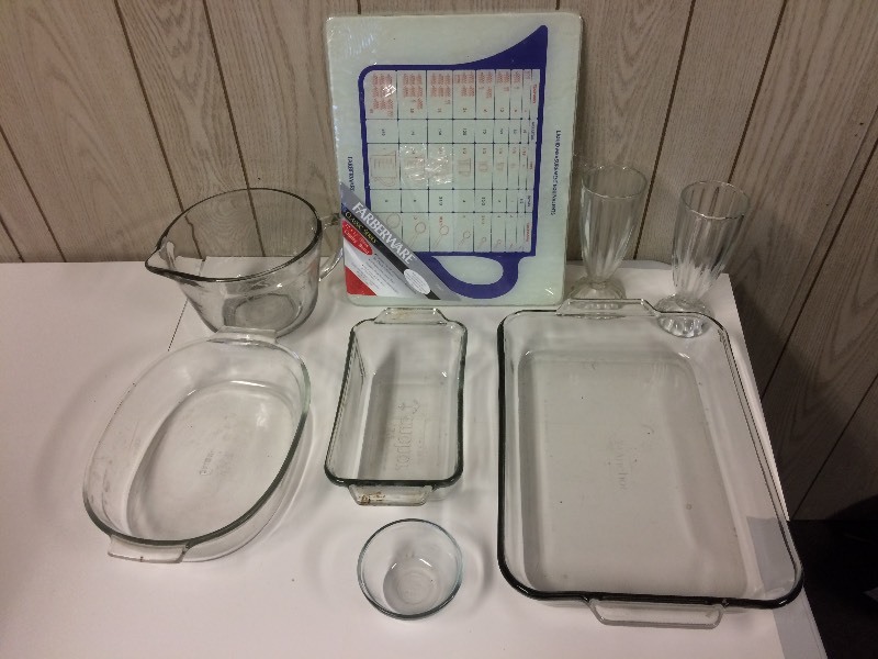 lot 64 image: Glass Cookware & New Farberware Cutting Board