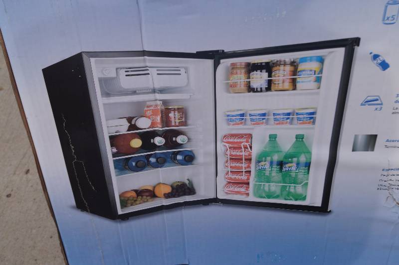 lot 211 image: NEW Haier 4.5 cu ft Mini Fridge