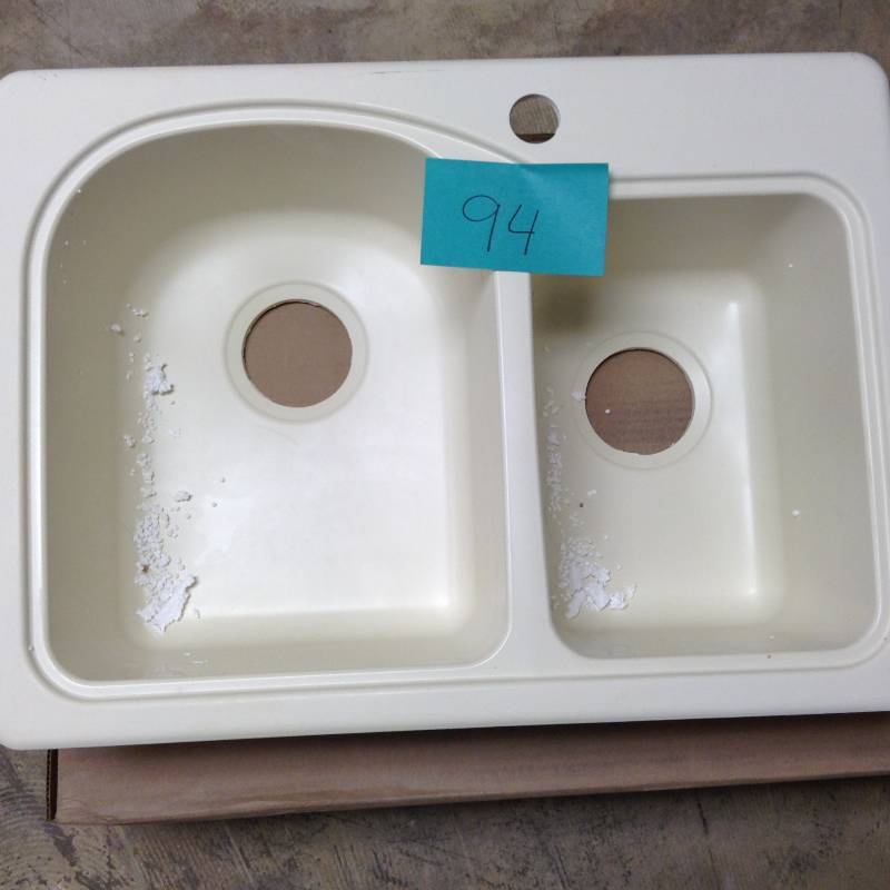 lot 94 image: Swan Dual Mount Composite 25 in. 1-Hole Double Basin Kitchen Sink in BoneDual Mount Composite 25 in. 1-Hole Double Basin Kitchen Sink in Bone not used