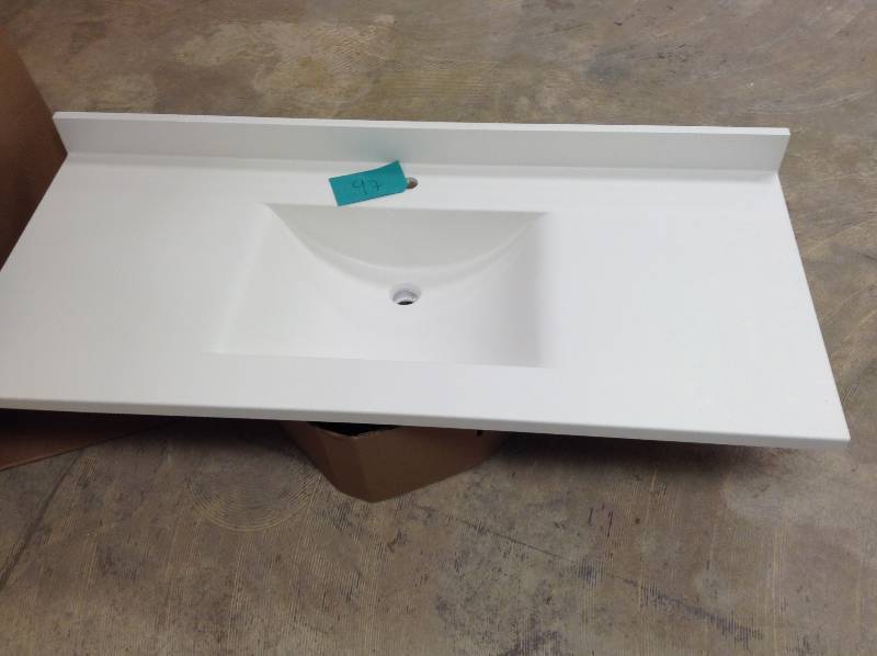 lot 97 image: Swan Contour 49 in. W x 22 in. D x 10-14 in. H Solid-Surface Vanity Top in Tahiti White with Tahiti White Basin- vanity top only new