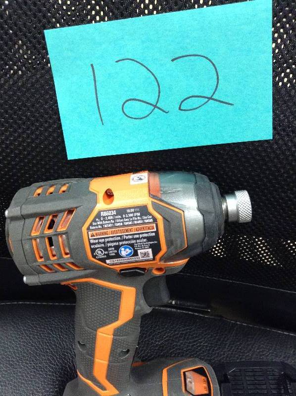 lot 122 image: Ridgid  18-Volt Lithium-Ion 14 in. Cordless Impact Driver Kit