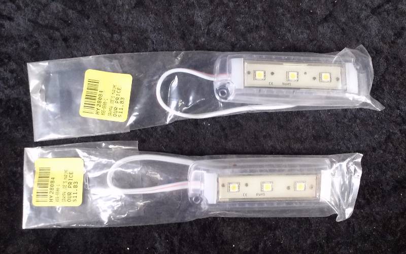 lot 157 image: Lot - (2) ILC Tri-Lite 4 x 1 RANGER Lights