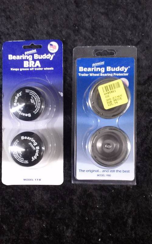 lot 172 image: Lot - Bearing Buddy Trailer Wheel Bearing Protector & Bearing Buddy Bra